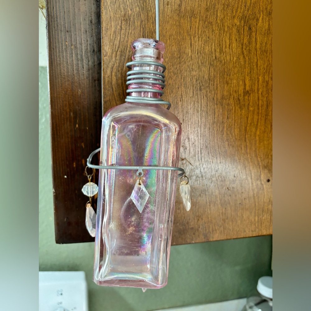 Handmade Vintage Upcycled Iridescent Pink Bottle with Charms And Wire